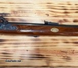 Thompson 50 cal black powder rifle w/accessories 