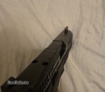Multiple guns long and pistol